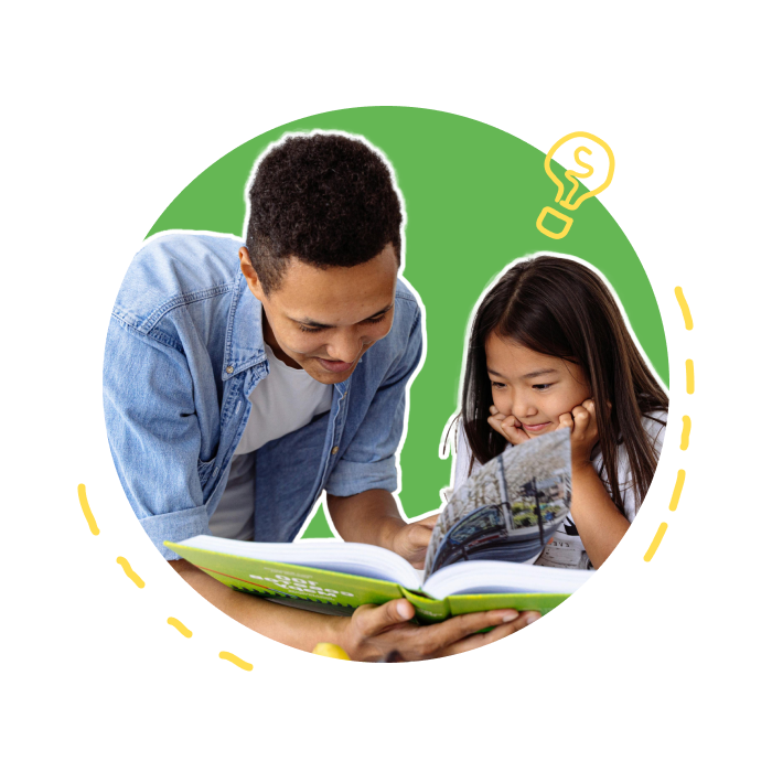 Father and daughter reading a book together